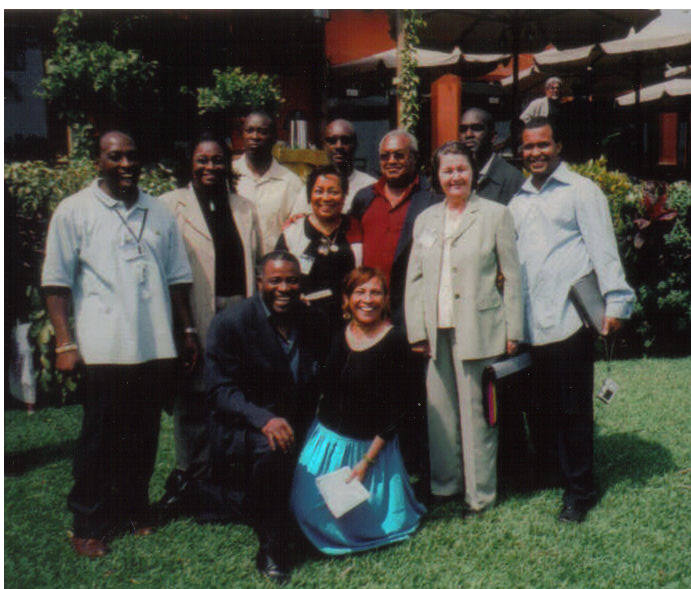 AFRE representatives: Back row: Jabari Akil, Raushana Karriem, Ajani Mukarram, Kamal Shabazz, Kamal Arshad, Ishmael Abdul-Salaam. Middle row: Harriett AbuBakr Muhammad, Mr. Silis Muhammad, Ida Hakim. Front row: Husamideen Fedayeen, Ikhlas Fedayeen.