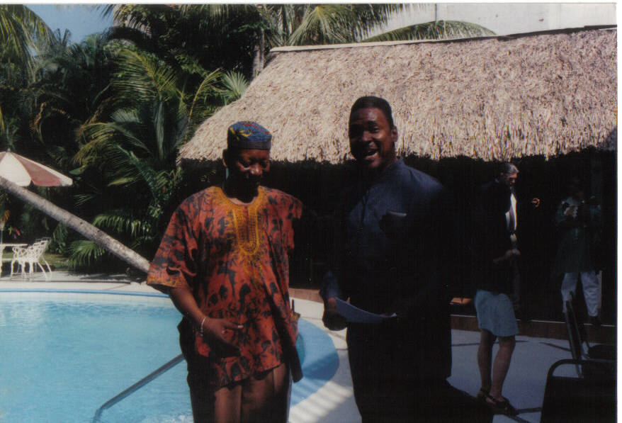 Celio Alvarez, Garifuna leader and host, stands with the representative from Panama